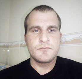Николай